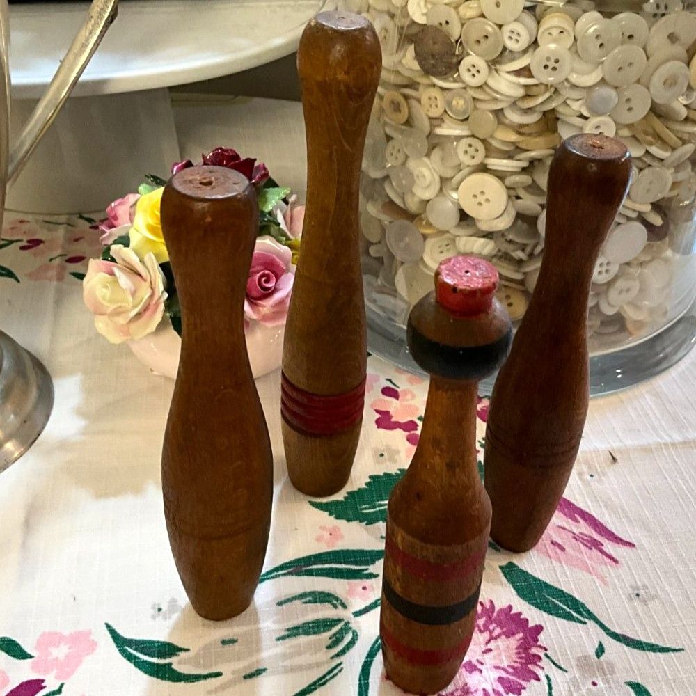 Antique wooden toy bowling pins/skittles collection of 4 vintage game pieces
